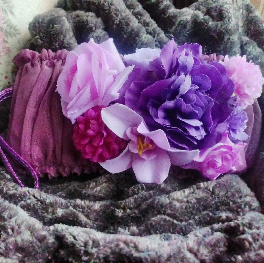 Handcrafted embellished wristlet bag